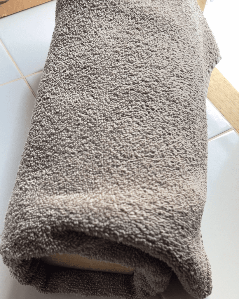 Soap mold wrapped in a towel.