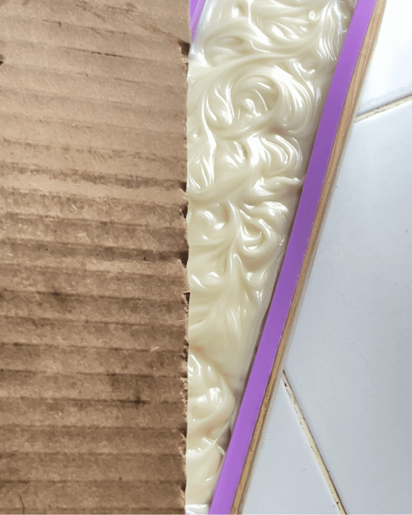 Soap mold being covered with cardboard