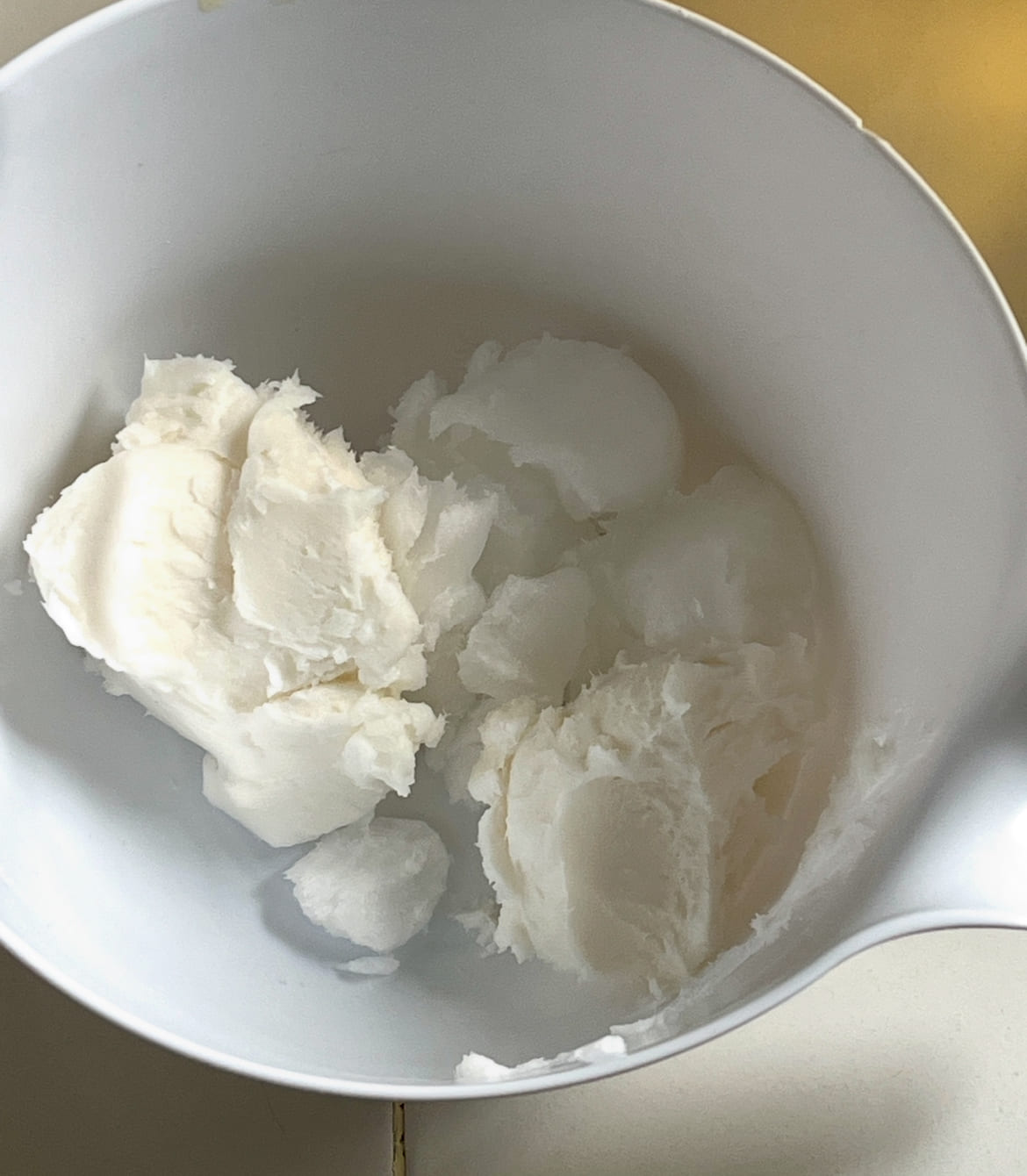 Bowl with tallow and coconut oils for soapmaking