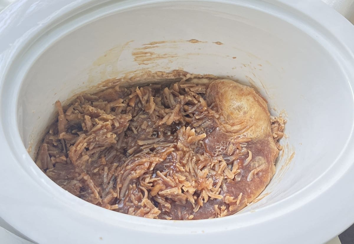 Hot process rebatch soap beginning to melt in the crockpot.