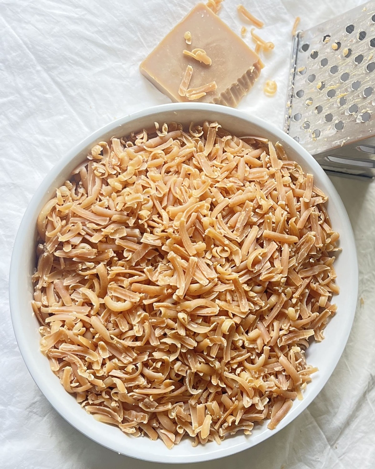 Overhead view of grated soap in preparation for making a rebatch of soap.